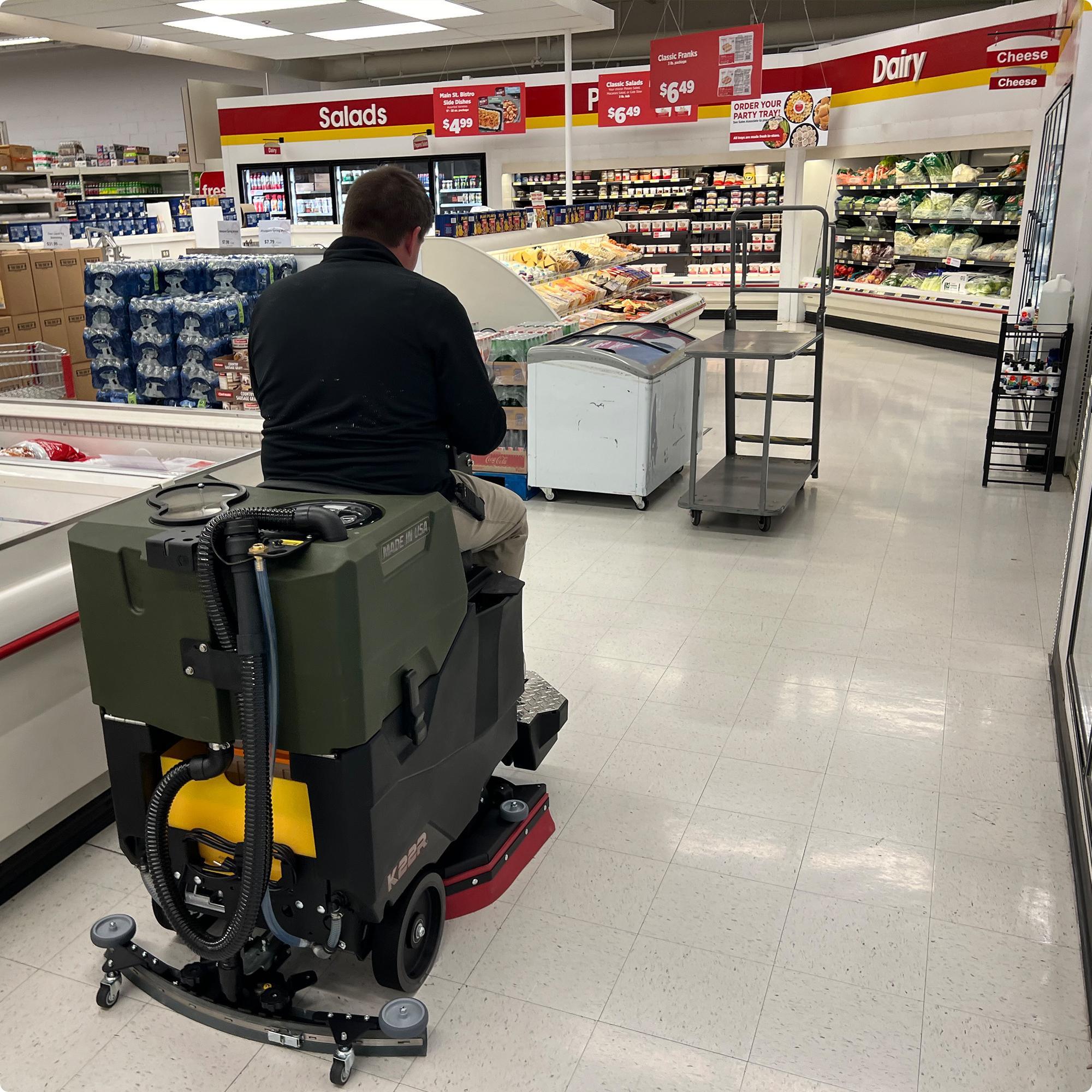 Kodiak K22R 26" Disk Deck Ride On Floor Scrubber cleaning VCT in a grocery store IMG00017