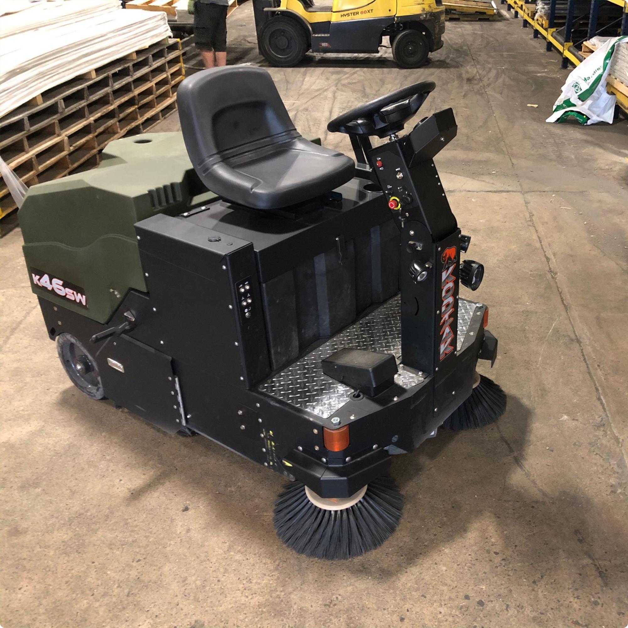 Kodiak K46SW 46" Ride On Floor Sweeper in a warehouse with concrete floors IMG00031